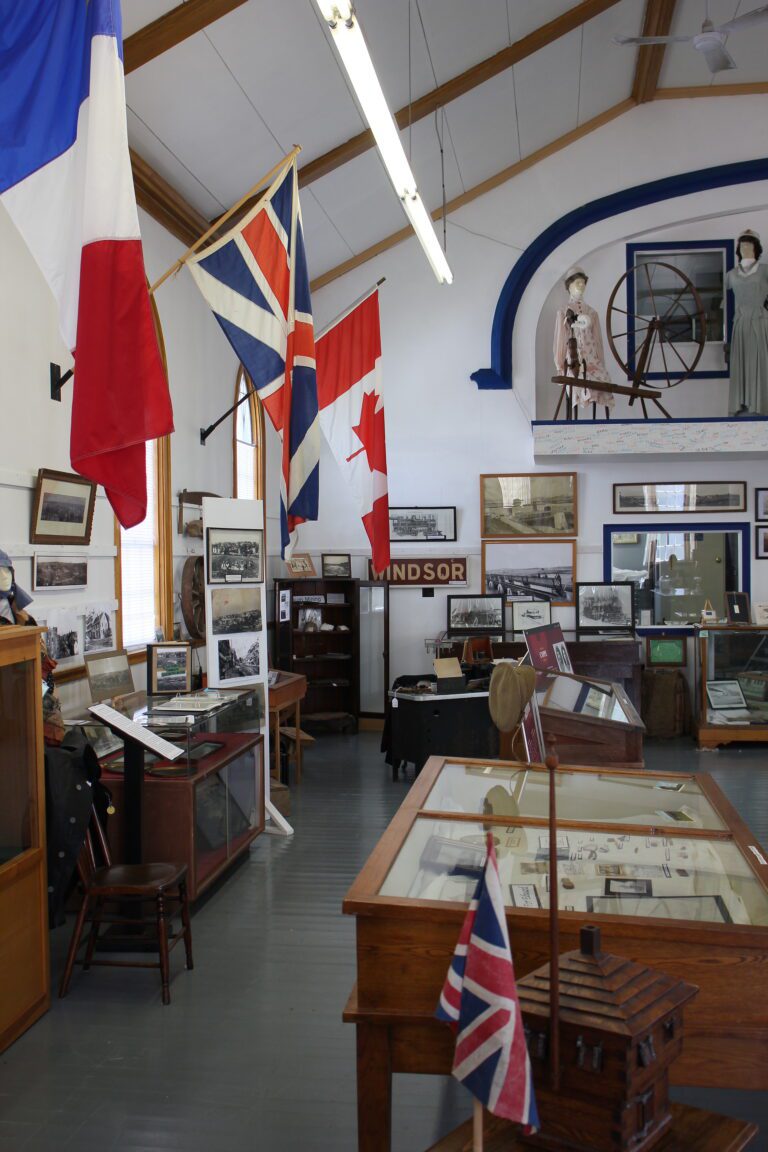 Interior historical museum photo with flags and display cases